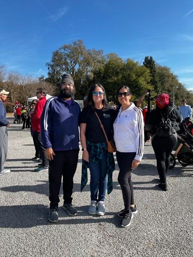 Attendees at the Heart Walk pose for a photo.