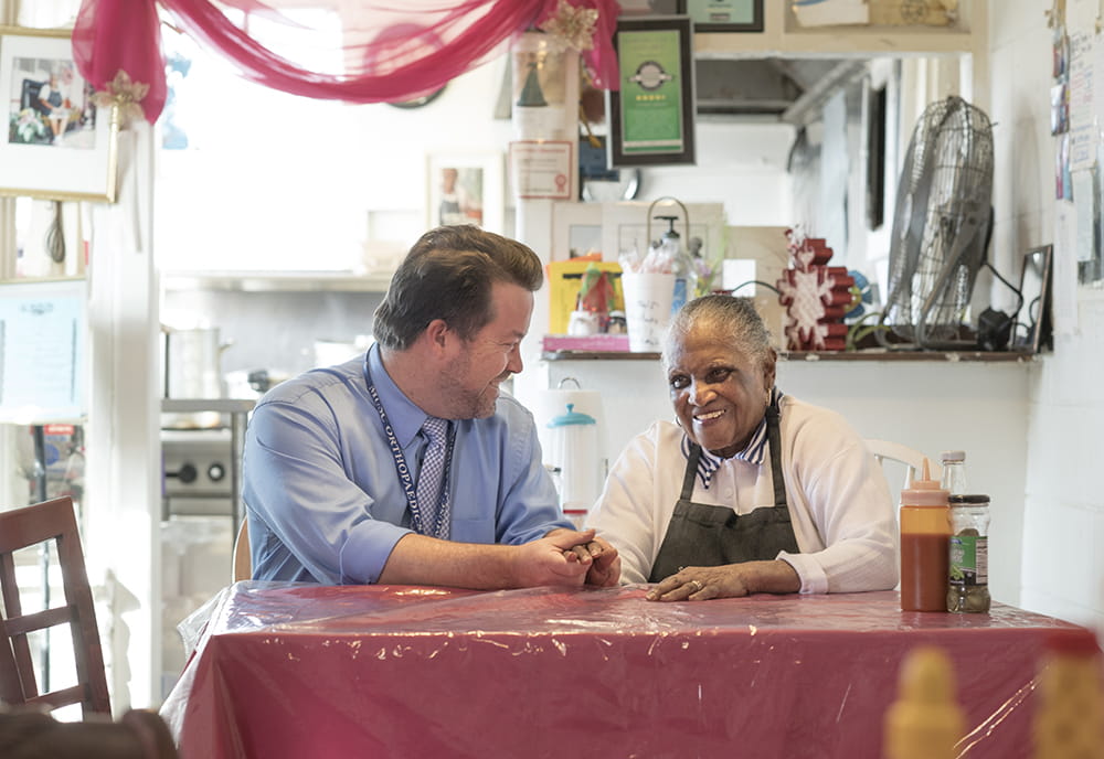 Kyle Kokko and Martha Lou Gadsden in her restaurant 