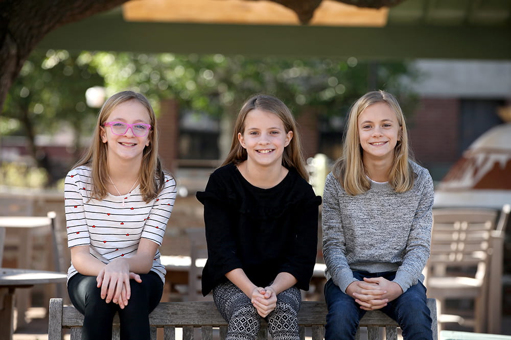 portrait of the Farr triplets