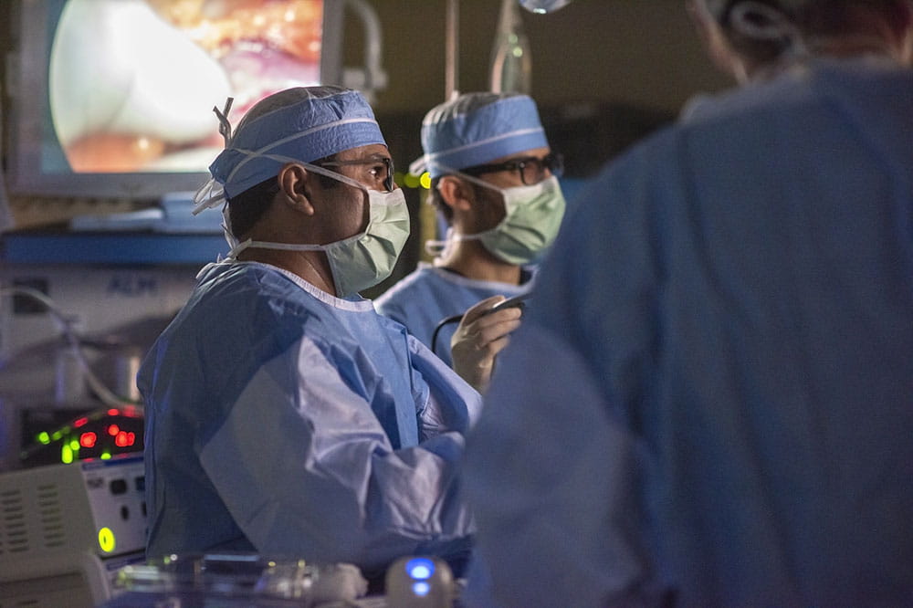 Dr. Satish Nadig in surgery.